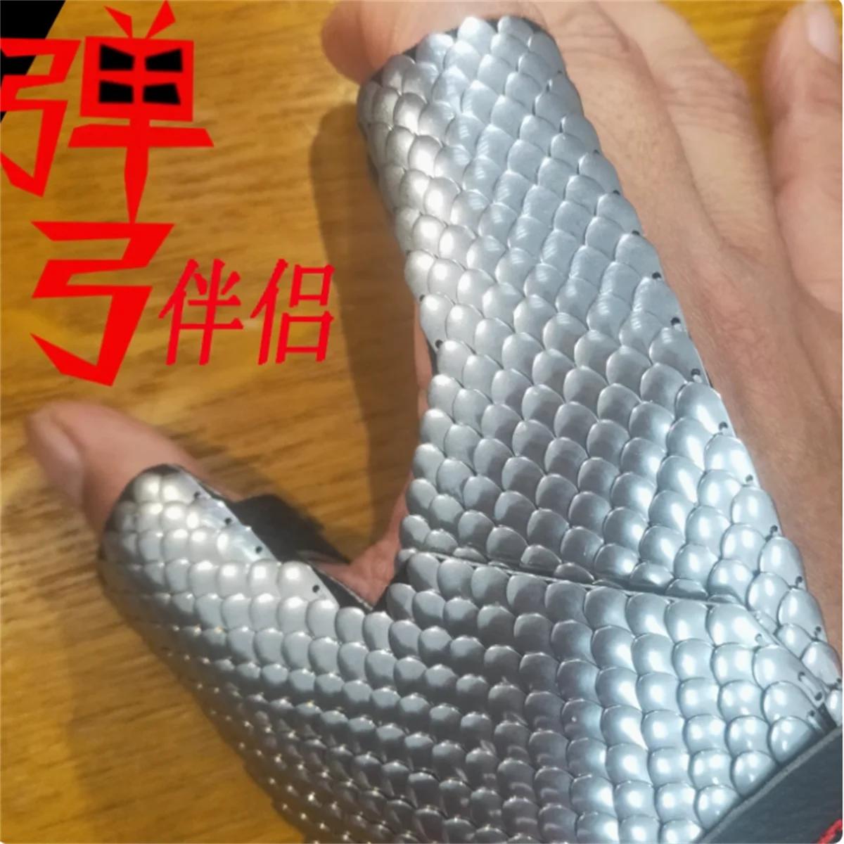 

Scaly gloves, archery slingshot protectors