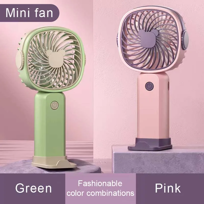 Mini handheld fan, when paired with the base, can be used as a phone stand. A lightweight and efficient cooling device.