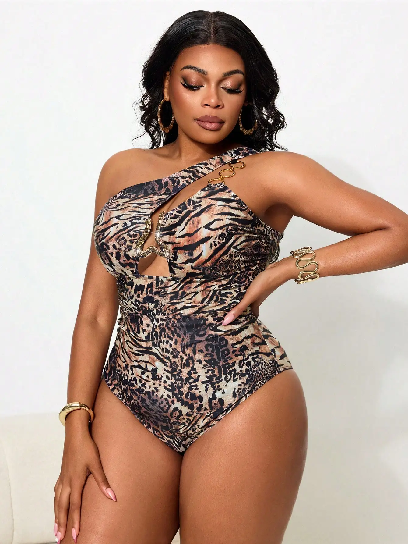 

One Shoulder Animal Print Swimsuit With Chest Cutout And Gold Ring Detail