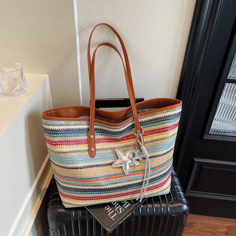 Rainbow-colored straw shoulder bag for women, suitable for beach vacations, spacious woven bucket tote