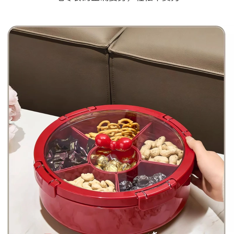 

Household living room coffee table rotating candy box grid sealing nut melon seed storage box