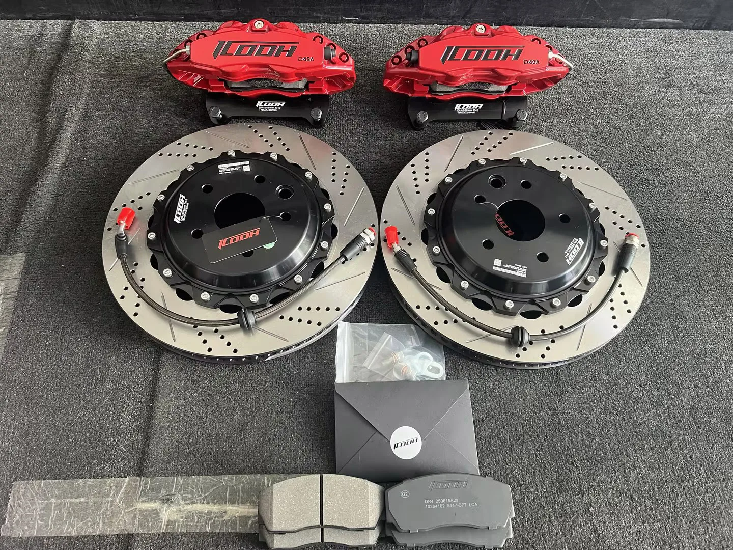 

Высококачественные 4-поршневые суппорты D42 в комплекте с 2-составными роторами 345*28 мм для Subaru Liberty 2.5i Sedan 2008 года.