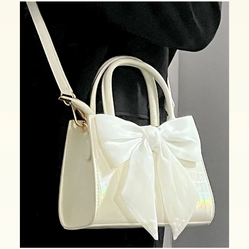 Bolso de mano tipo clutch para mujer, de moda, color rosa, con lazo, para el verano, bolso de hombro pequeño cuadrado para mujer, estilo dulce y femenino.