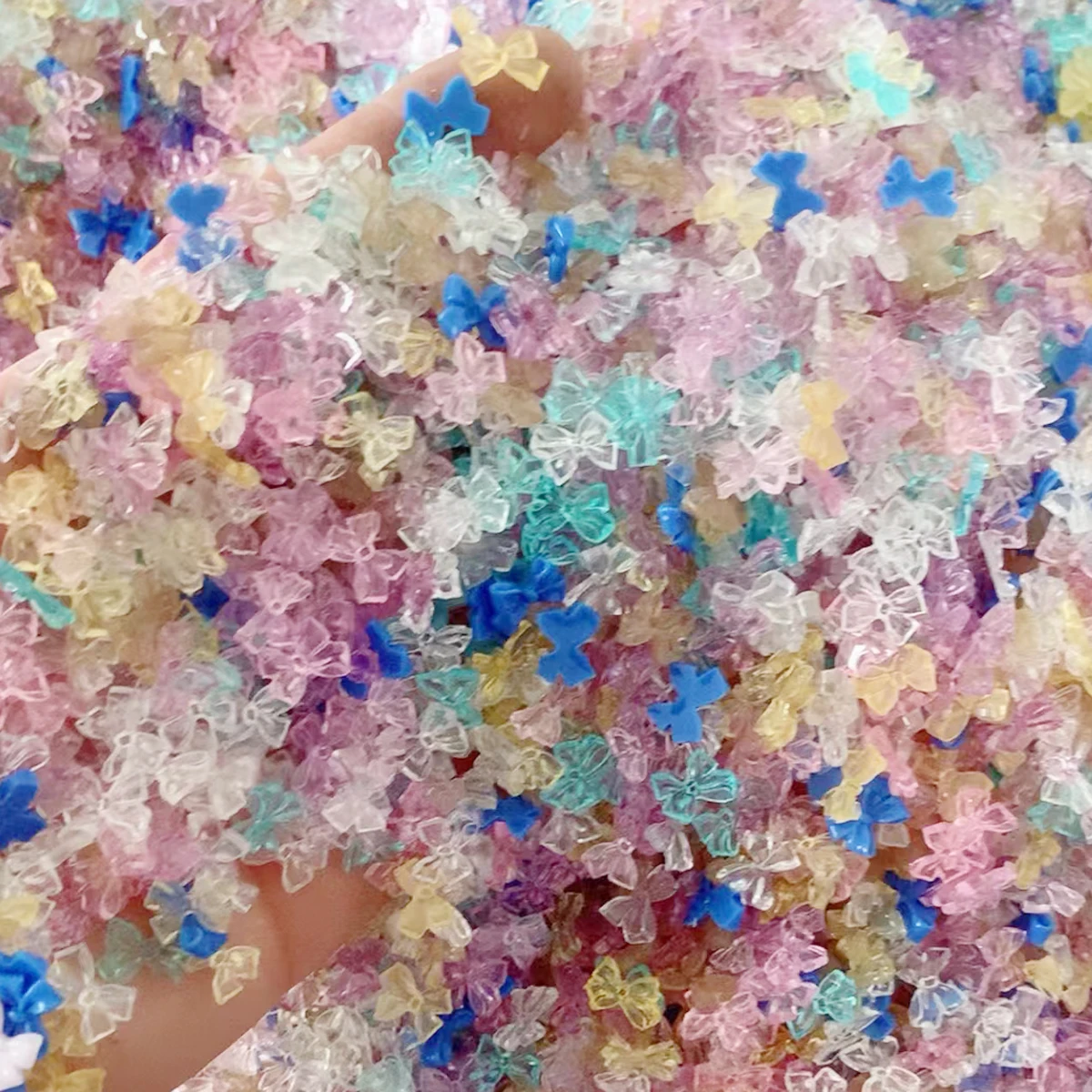 50g 3D zufällige gemischte Harz Schleife/Diamant Nail Art Charms Cartoon Formen Herz/Blume/Band Strass niedlich DIY Maniküre Zubehör – Detail 12