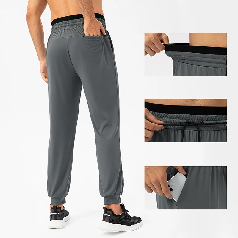 Calça de corrida masculina, calça esportiva de fibra, perna elástica, treino casual ao ar livre