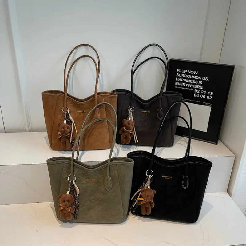 

Luxury Minimalist Trendy Diaper Bag A Solid Color Classic Leather Shoulder Bag For The Elegant Chic Fashion Woman