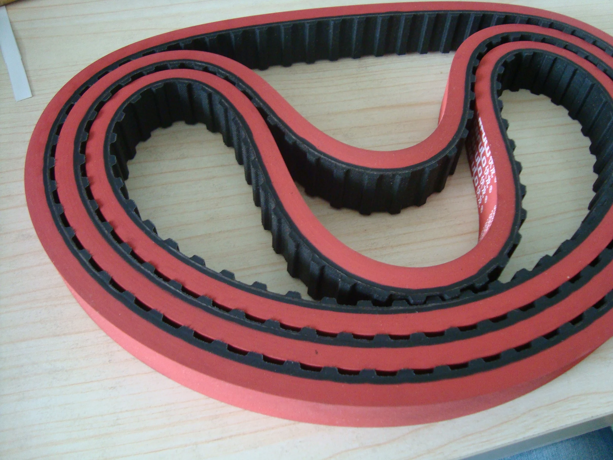 300H with 7mm red rubber coated timing belt sell by on sleeve