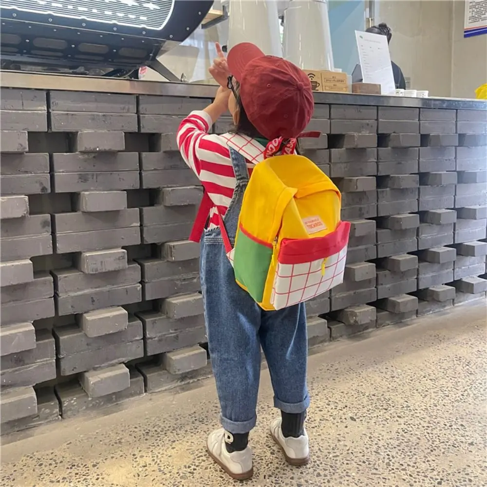 حقيبة كتب شخصية بألوان متباينة منقوشة حقيبة ظهر ذات سعة كبيرة من النايلون للأطفال حقيبة مدرسية على الطراز الكوري حقيبة كتف لطيفة