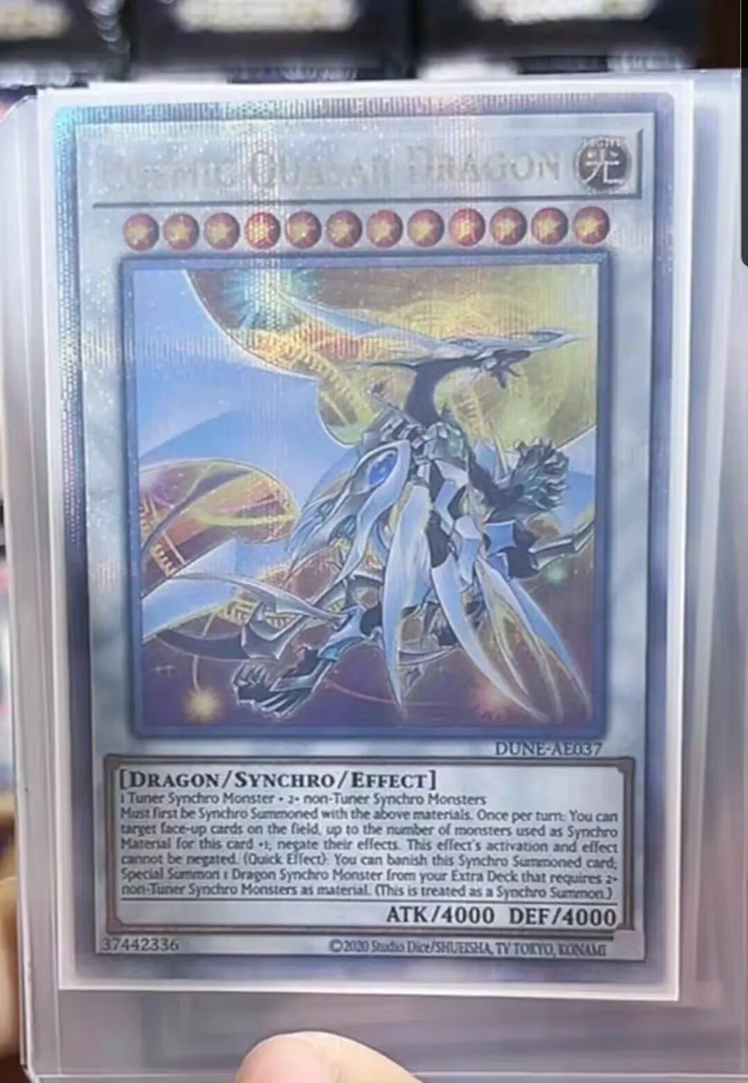 

Yugioh KONAMI DUNE-AE037 Cosmic Quasar Dragon 25th Quarter Century Secret Rare Asian English Collection Mint Card