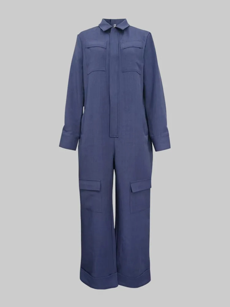 بدلة قفز نسائية من Onecozyday باللون الأزرق الداكن وياقة على شكل طية صدر وأكمام طويلة وسحاب من قطعة واحدة سراويل من قطعة واحدة 2025 ملابس غير رسمية ملابس الشارع