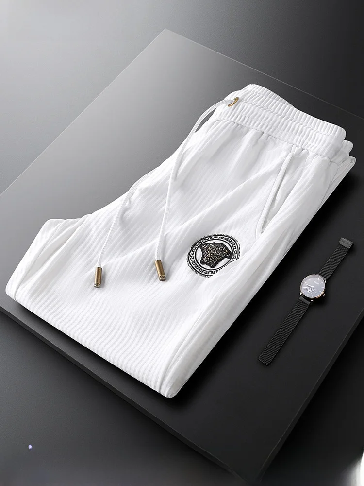 

Мужские повседневные тонкие летние брюки в клетку Slim Fit, белые, зауженные, молодежные, спортивные, не мнущиеся