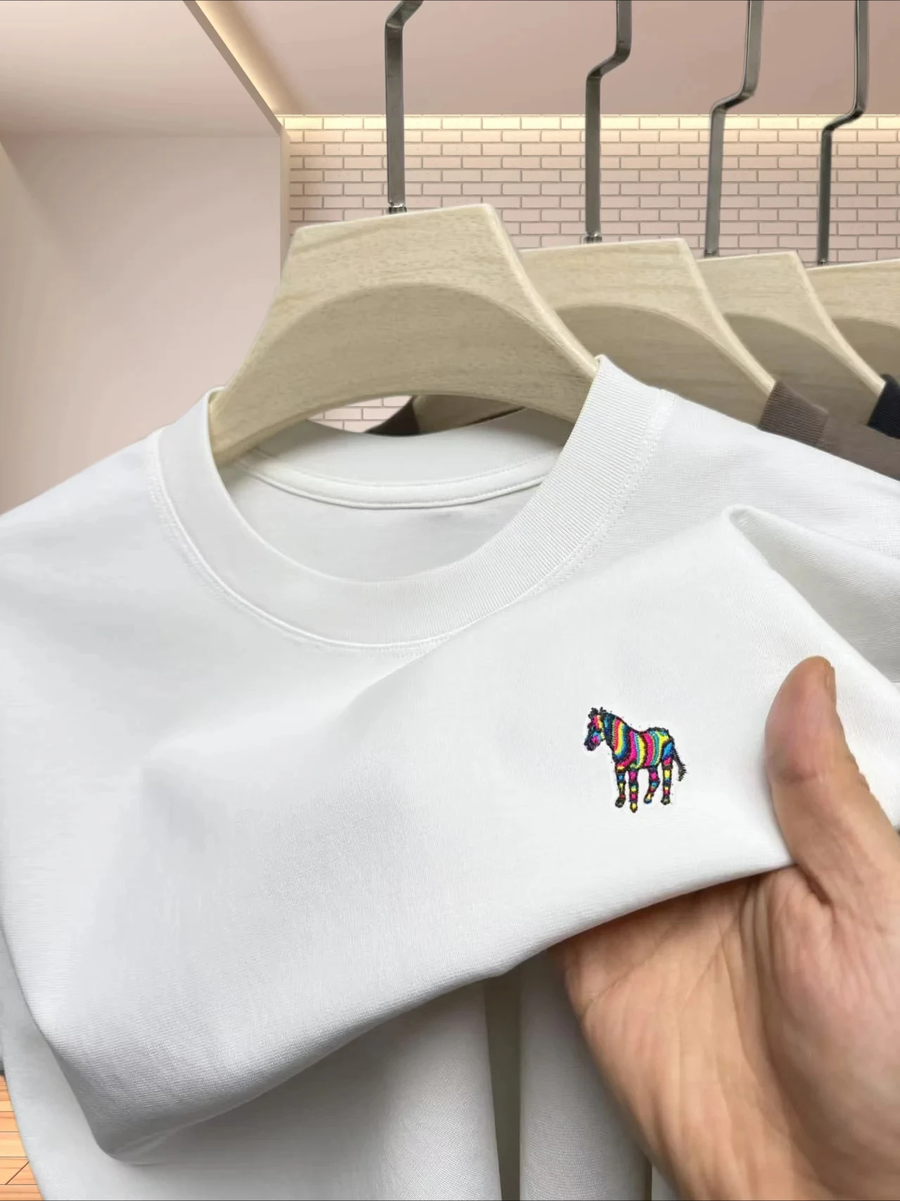 Brand Men's and Women's Summer New Short sleeved Fashion Exquisite Printed T-shirt High quality Short sleeved 2026 High end