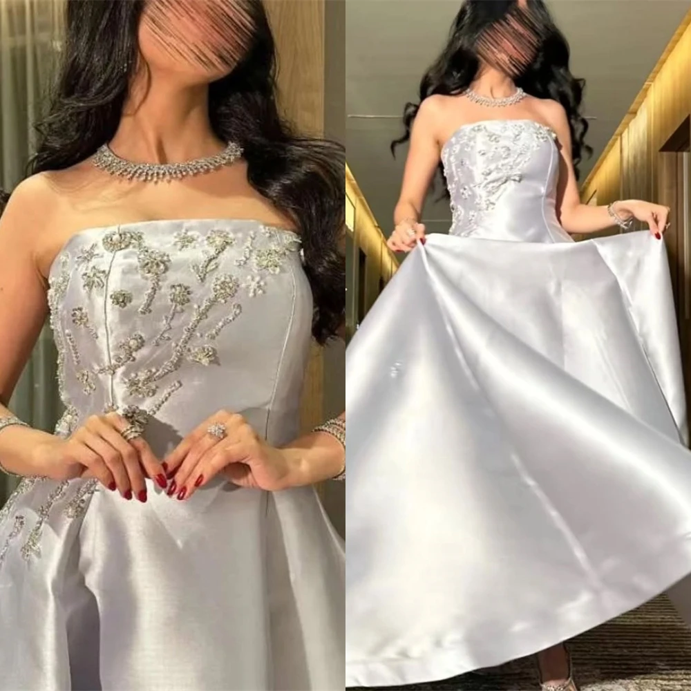 فساتين حفلات مخصصة من الساتان الفضي بدون حمالات، فستان سهرة رائع من الكريستال واللؤلؤ الكلاسيكي على شكل حرف A لحفلات العودة للوطن