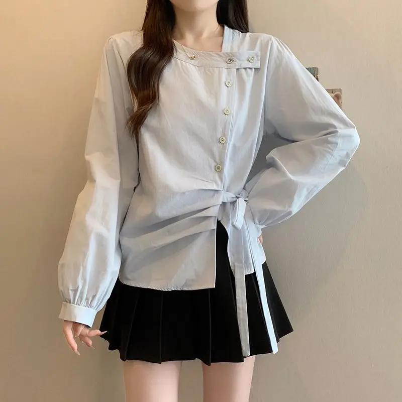 Femme Primavera Estate Tendenza moda coreana Bottoni Tinta unita O-Collo Camicie da donna Pullover a maniche lunghe con coulisse alla moda