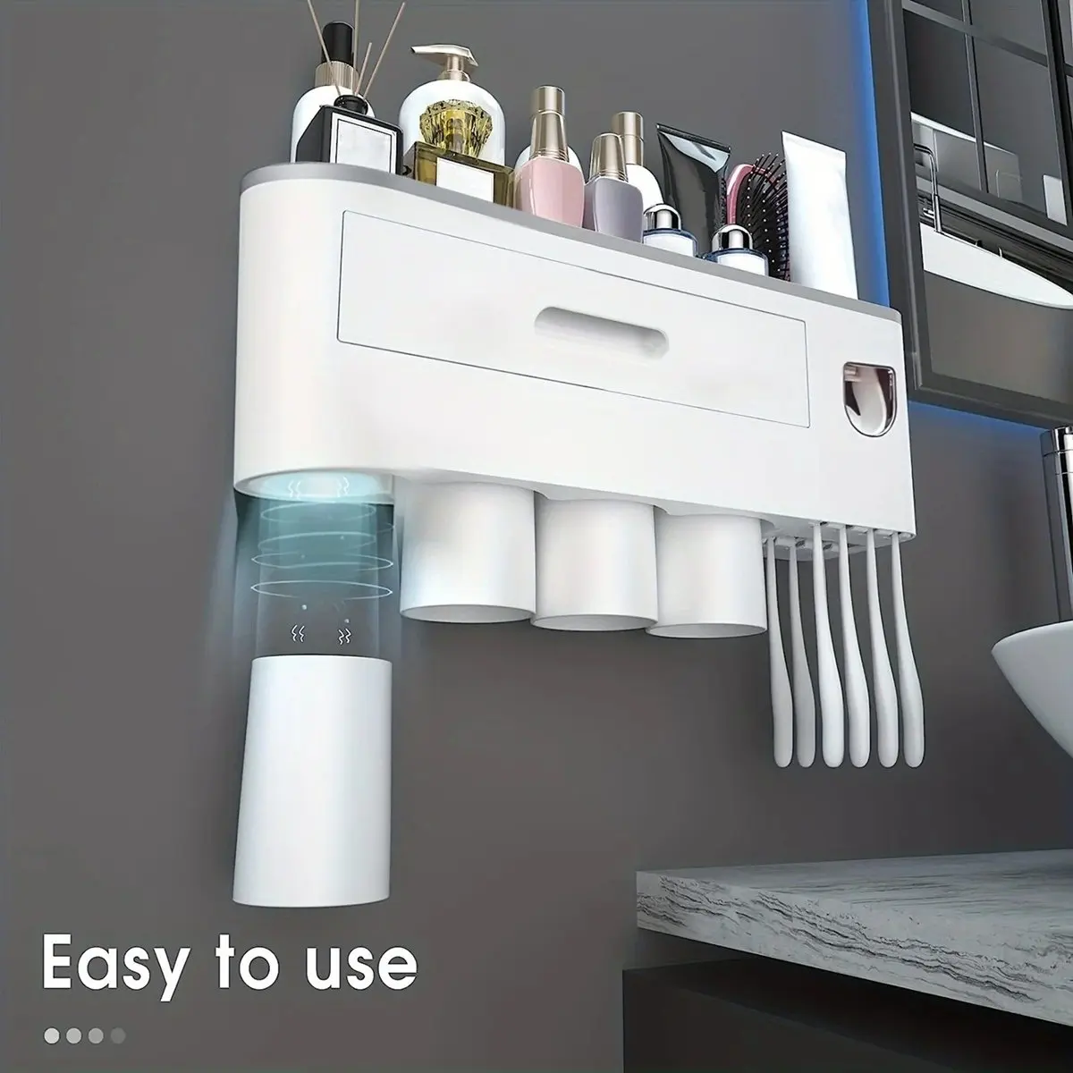 

A Wall-Mounted Toothbrush Holder with 4 Cups, A Large Tray, and 1 Makeup Drawers.