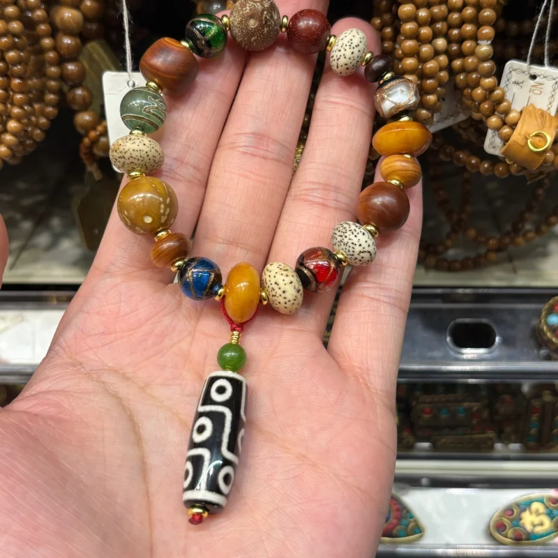 

Nine-Eyed Dzi Bead Multi-Treasure Bracelet with Ash Glaze, Moon, Cliff Cypress, Purple Gold Rat, Tuogu, etc. Brace