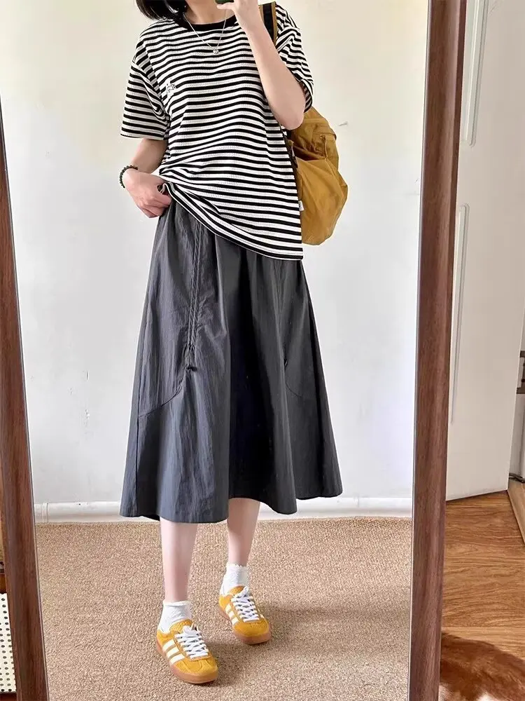 Femme nouveau dans les vêtements a-ligne taille haute décontractée minceur gâteau jupe polyvalent mi-longue robe douce noir jupe longue tout-match