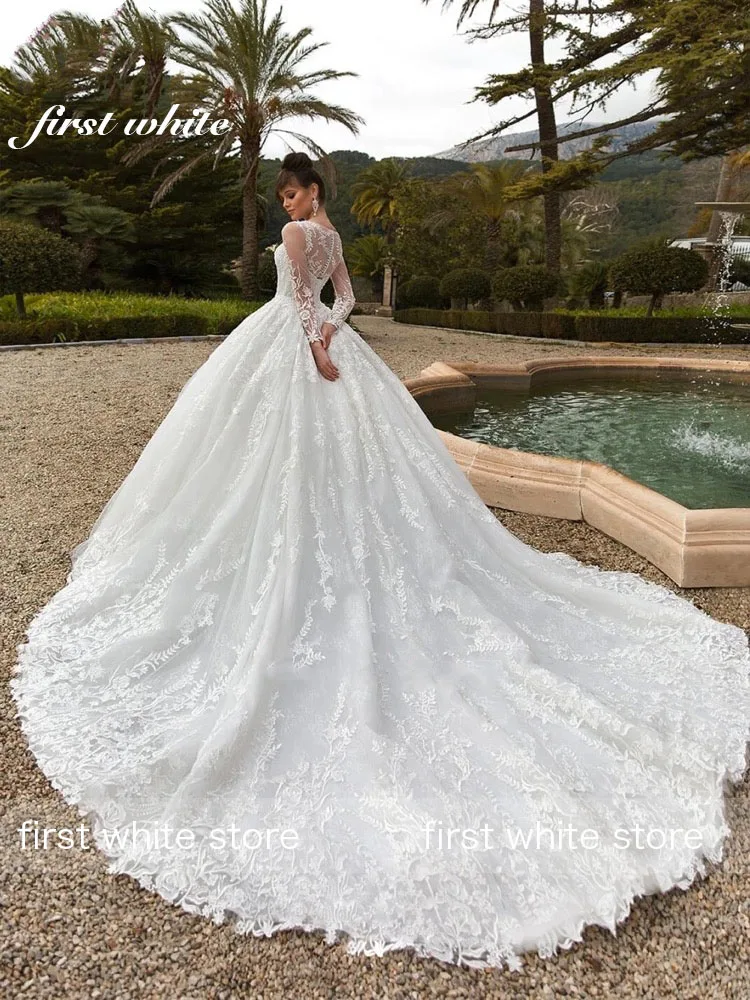 فساتين زفاف مخصصة بأكمام طويلة ورقبة دائرية مزينة بأربطة فستان زفاف الأميرة فيستدو دي نويفا