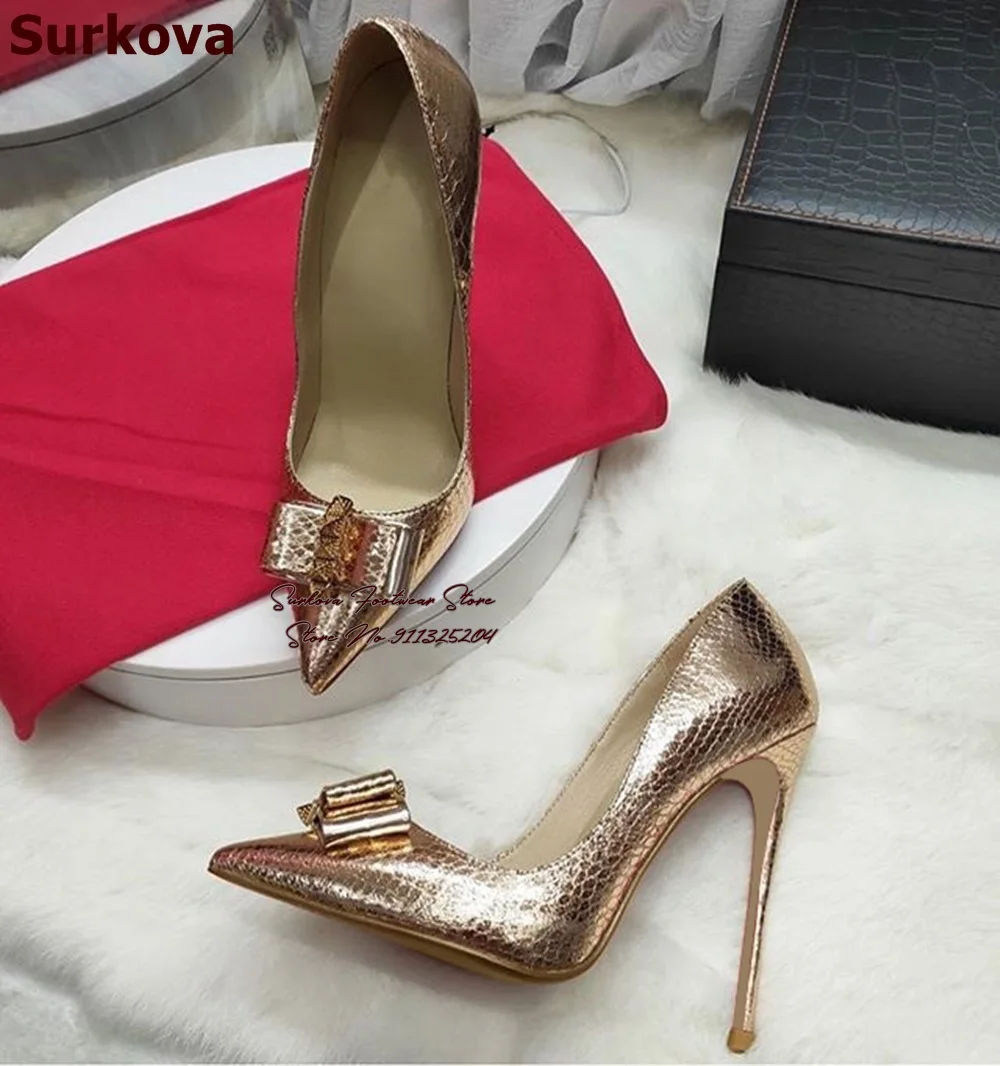 

Surkova Gold Snakeskin Sky High Heel Bowtie Wedding Shoes Butterfly-knot Studded Pointed Toe Shallow Pumps Slip-on Banquet Heels