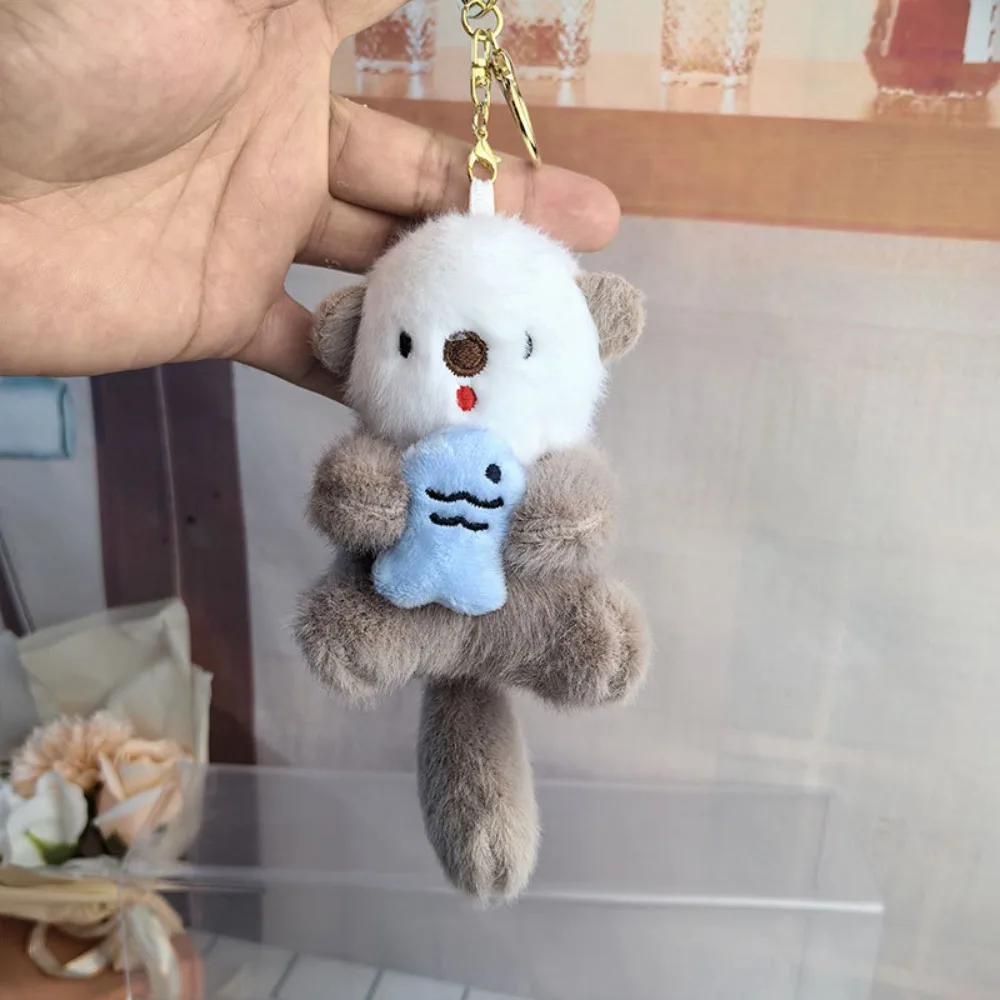 

Backpack Decor Holding Fish Cartoon Otter Keychain Fluffy Stuffed Plush Otter Bag Pendant 16cm Soft Otter Plush Keyring Unisex