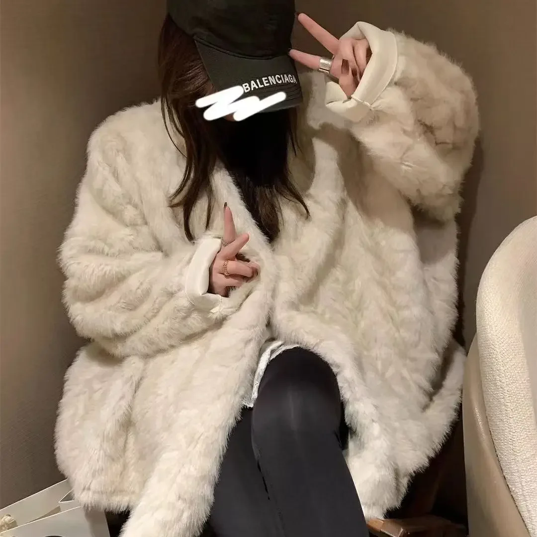 معطف علوي نسائي جديد لشتاء 2024 معطف ناعم منفوش من الفرو الصناعي بأكمام طويلة معاطف فضفاضة على الموضة الكورية معاطف نسائية وسترات ملابس