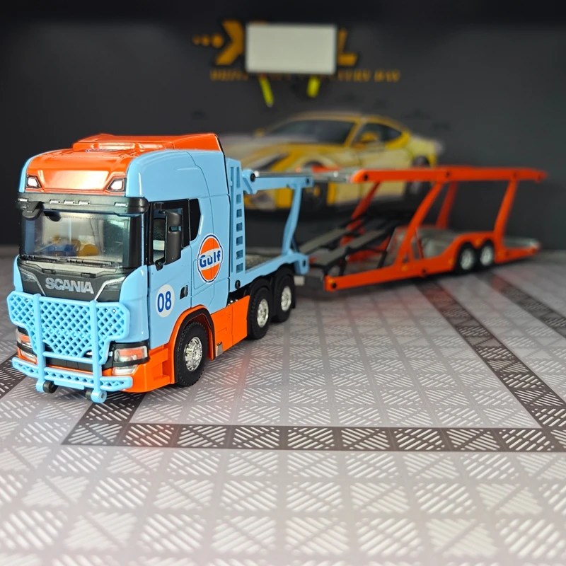 

Модель грузовика Scania с двумя этажами, масштаб 1:50, из цельного сплава, с открывающимися дверями.