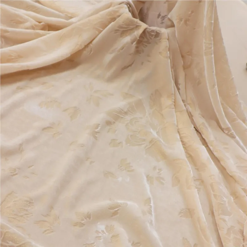 

Silk-woven golden flowered velvet fabric is used as the for cheongsam dresses