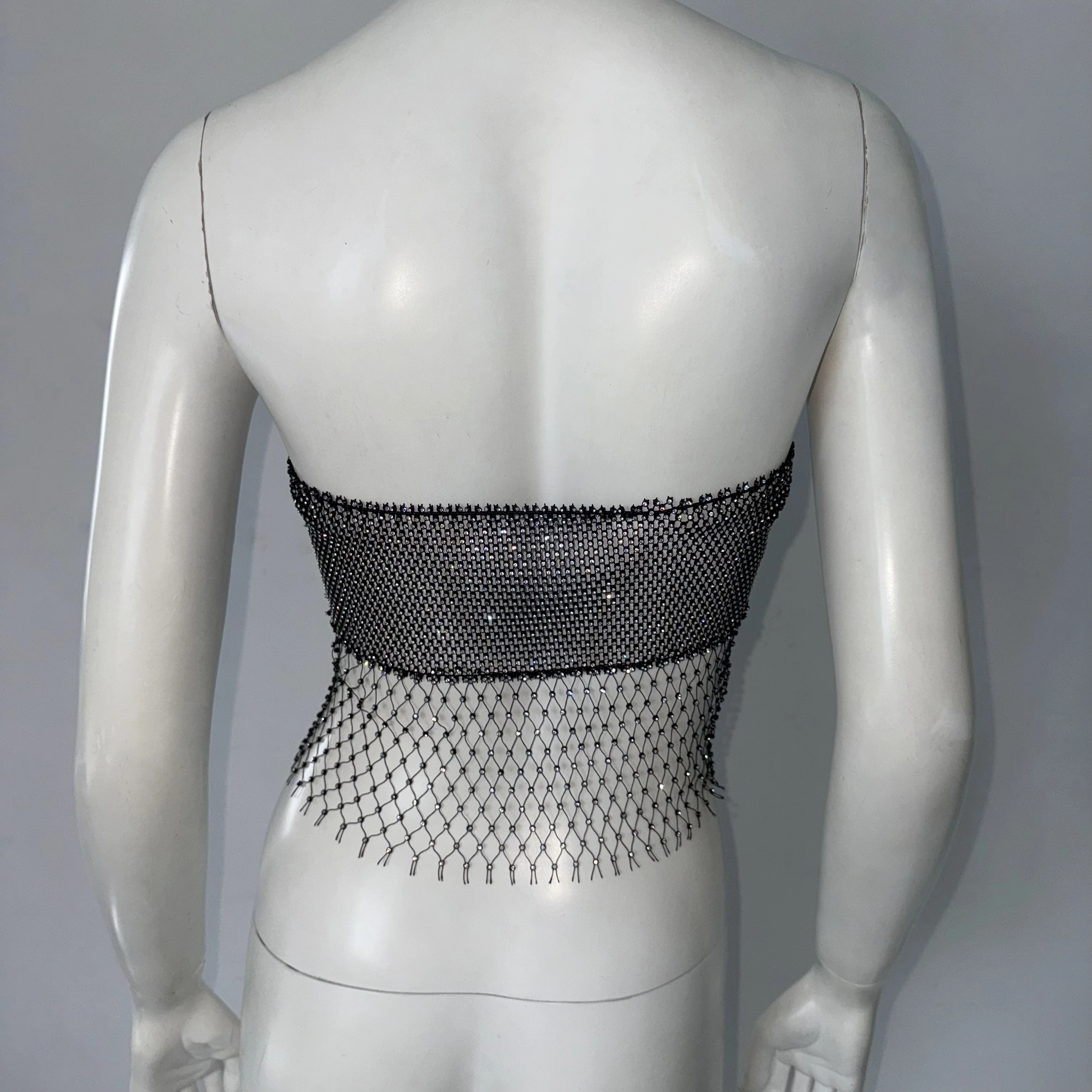 Camisola de rejilla de diamantes de imitación de lujo para mujer, camisetas de tubo sexis transparentes con agujeros y espalda descubierta, camisetas sin mangas de fiesta con borlas y lentejuelas