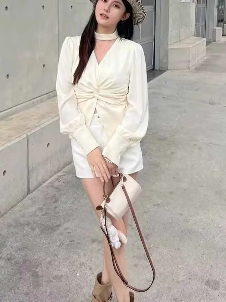 

European and American style winter new fashionable women's clothing V-neck halter neck waist-cinching spliced long sleeve shirt