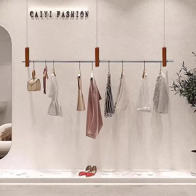 Clothing store display rack stainless steel hanger hanger wood grain color brick and mortar store decoration wedding dress