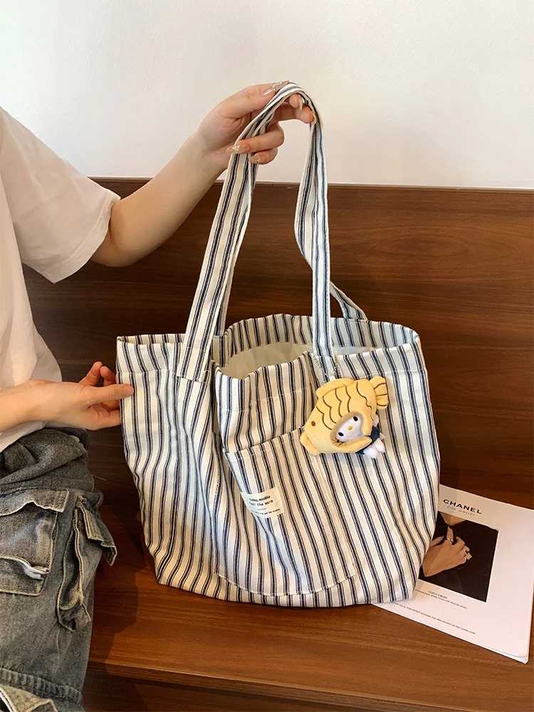 

Laid-ba Large Capaci Striped Canvas Tote Bag Commuter Single oulder op Bag Faionable Korean Sle Soft Handbag