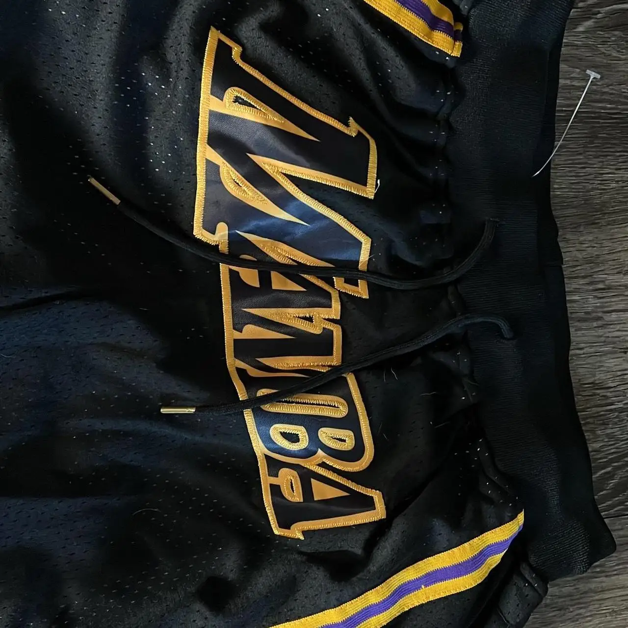 2026 الصيف الساخن بيع السراويل التجفيف السريع تنفس الرجال والنساء السراويل الرياضية عارضة فضفاض المألوف المتضخم السراويل