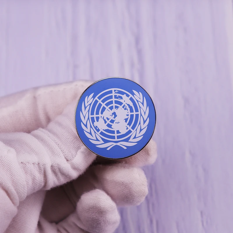 معطف الأسلحة للأمم المتحدة علم الأمم المتحدة شعار وطني بروش شارات طية صدر السترة دبوس