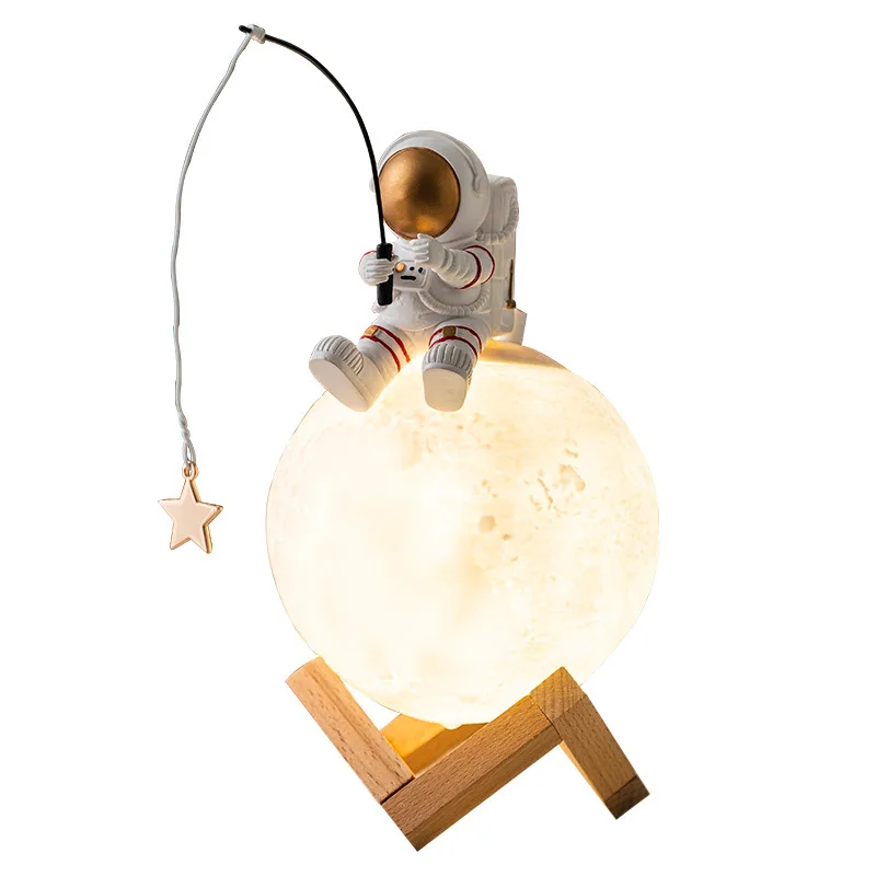 Astronauta lampada da scrivania decorazione della casa resina spazio uomo Usb tavolo luce notturna umidificatore nebbia fredda decorazione della stanza dei bambini lampada da lettura