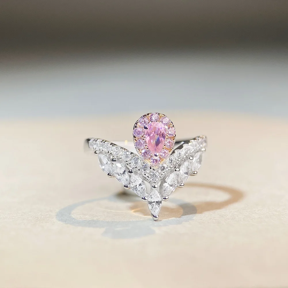 PT950 platinum ring in an elegant minimalist style with small pink diamonds