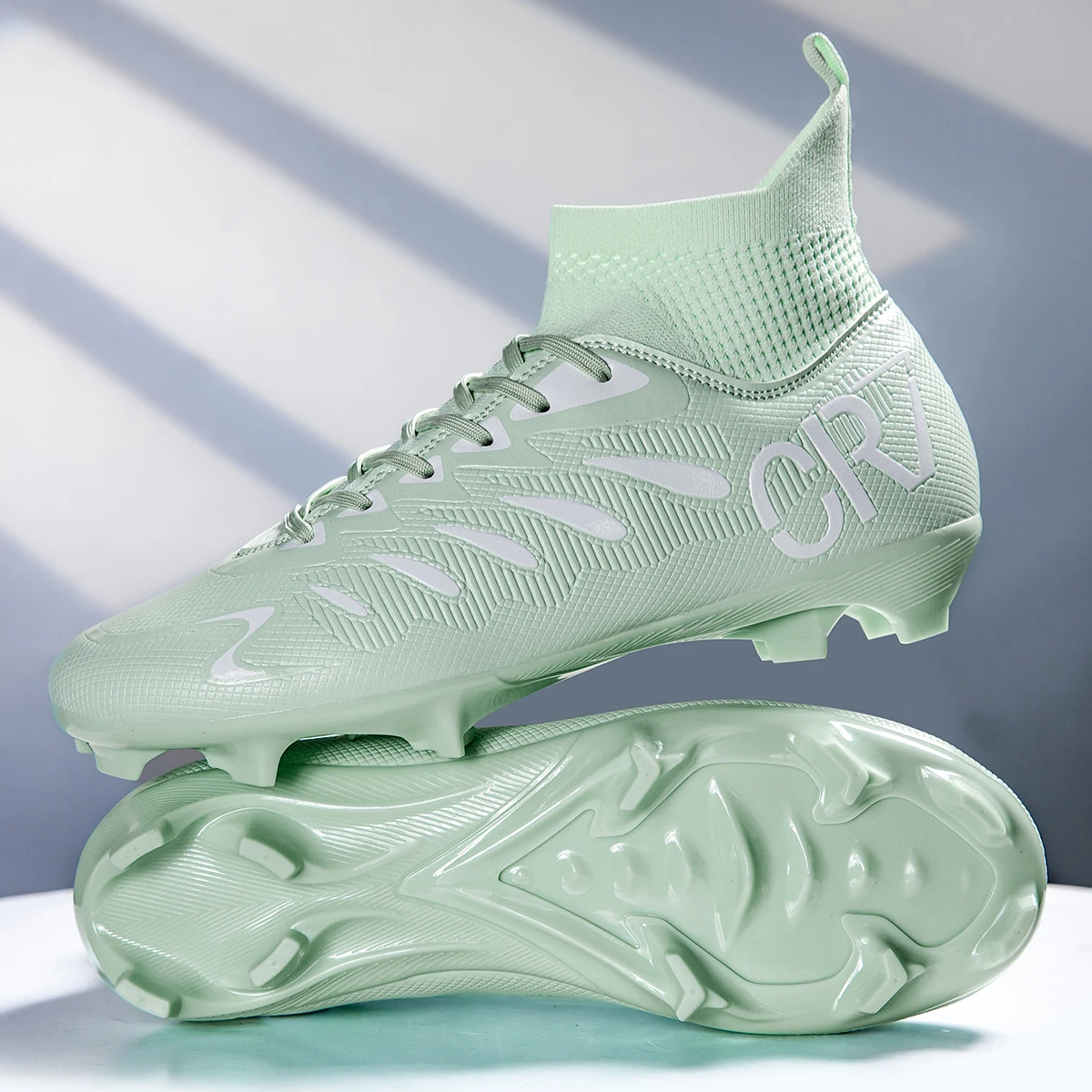 

Professional breathable football shoes with FG spikes provide super strong grip and effectively protect the ankle