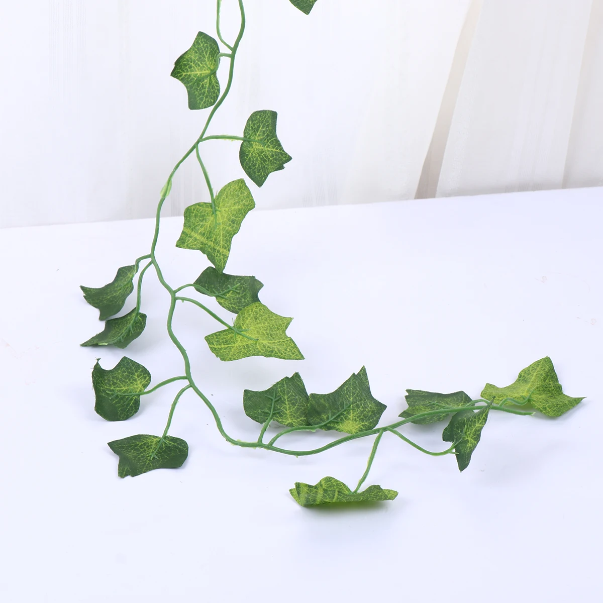 

Premium Artificial Green Leaf Vine Fake Creeper Vines for Pet Nest Decor Simulated Plants Party Wedding Home Office Decoration
