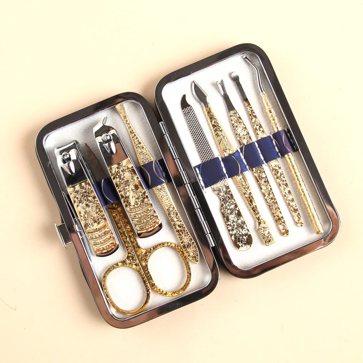 Gold-plated ice flower beauty suit nail clippers beauty scissors eyebrow clip ear spoon file 9 pieces of nail suit easy to carry