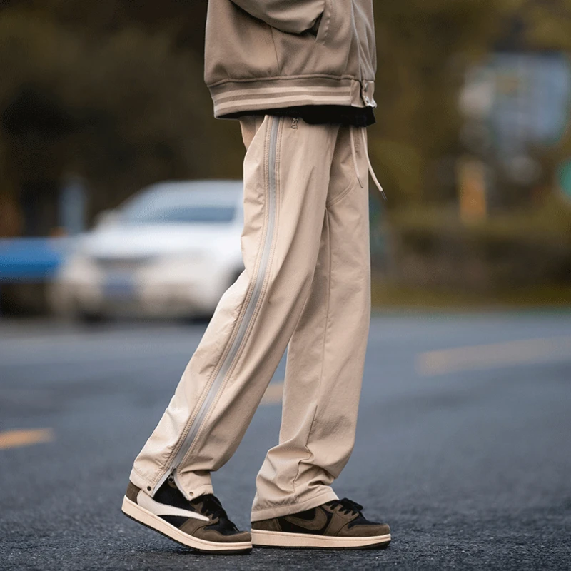 

Men Pants Pure Color Side Zipper Design Sporty Functional Techwear Windproof Parachute Outer Trousers Leisure Chic Simple Ins