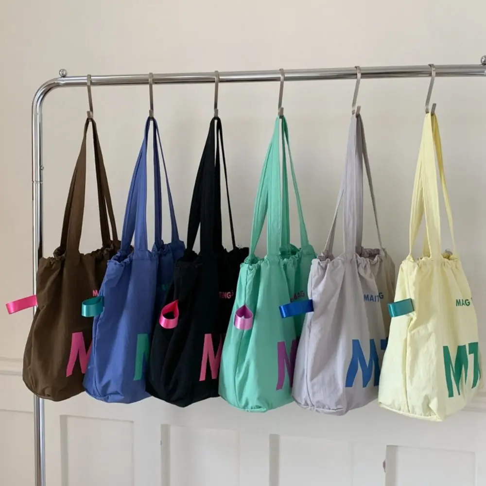 

Fashion Solid Color Drawstring Bags Nylon Light Weight Letter Shoulder Bag Large Capacity Shopping Tote Bags Summer