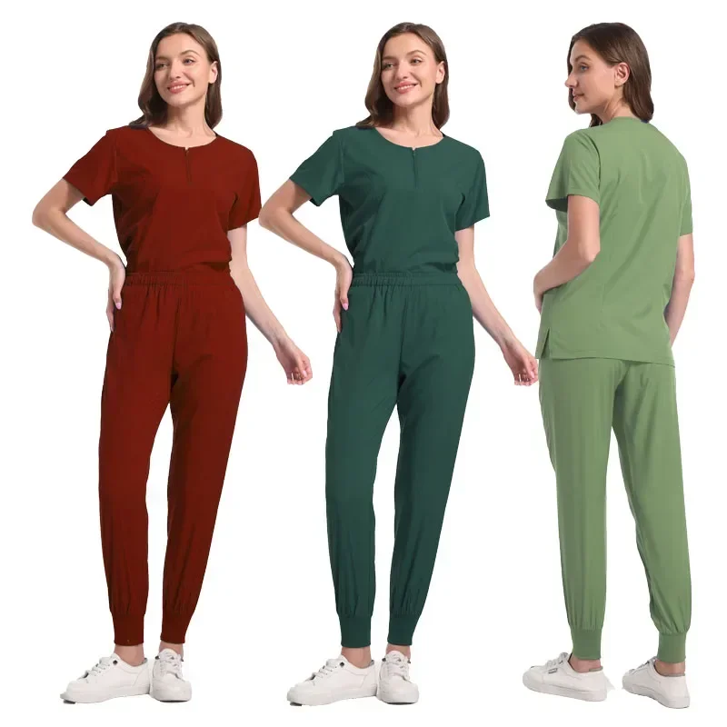 Uniformi mediche unisex Uomo Donna Abbigliamento infermieristico Costume di bellezza Infermiera Scrub Set Dottore Dentista Abbigliamento da lavoro Clinico Top Pantaloni