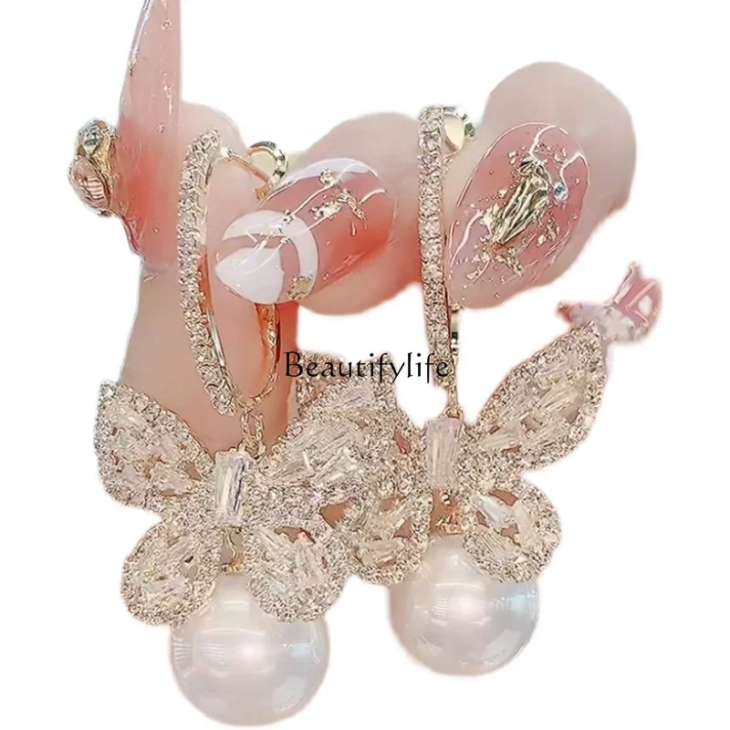 

Super fairy shiny zircon bow pearl big earrings autumn and winter new anti-allergic earrings