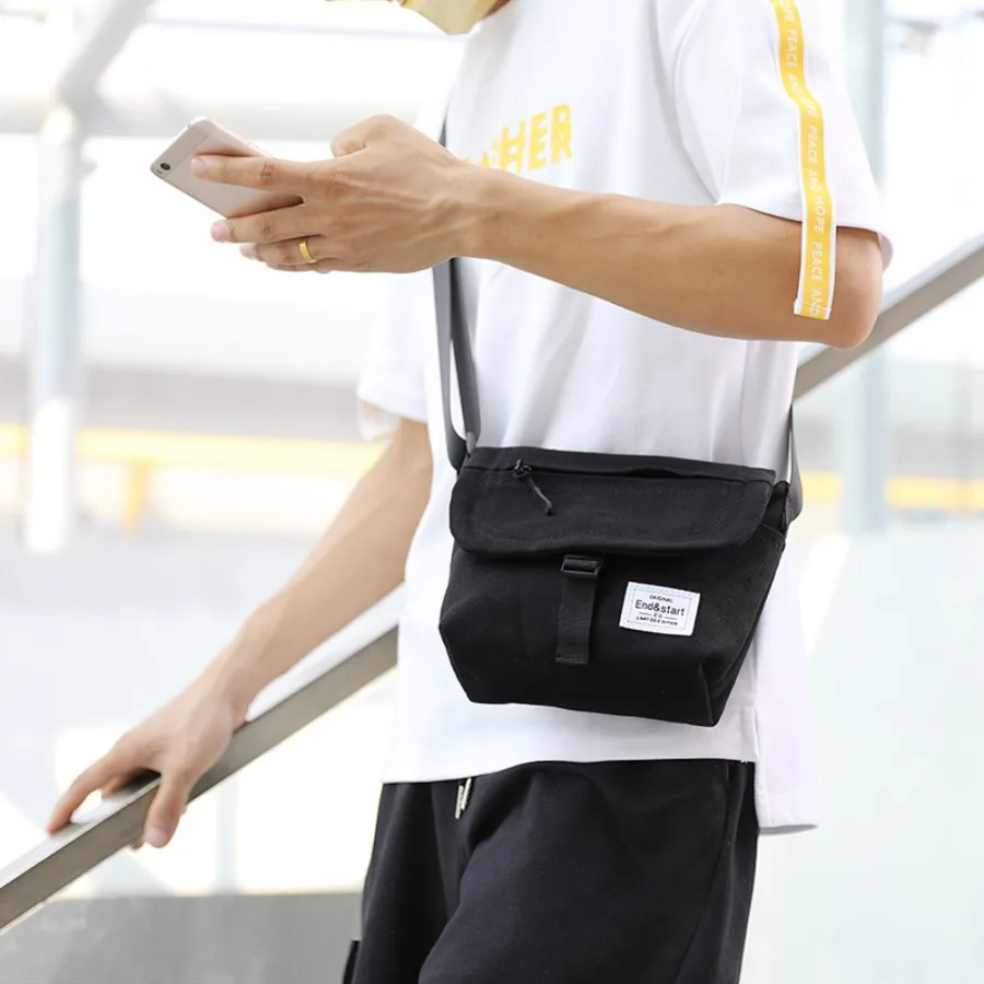 

【Spot goods】Backpack men's fashion brand canvas shoulder bag men's -legged backpack mobile phone bag backpack men's hair.