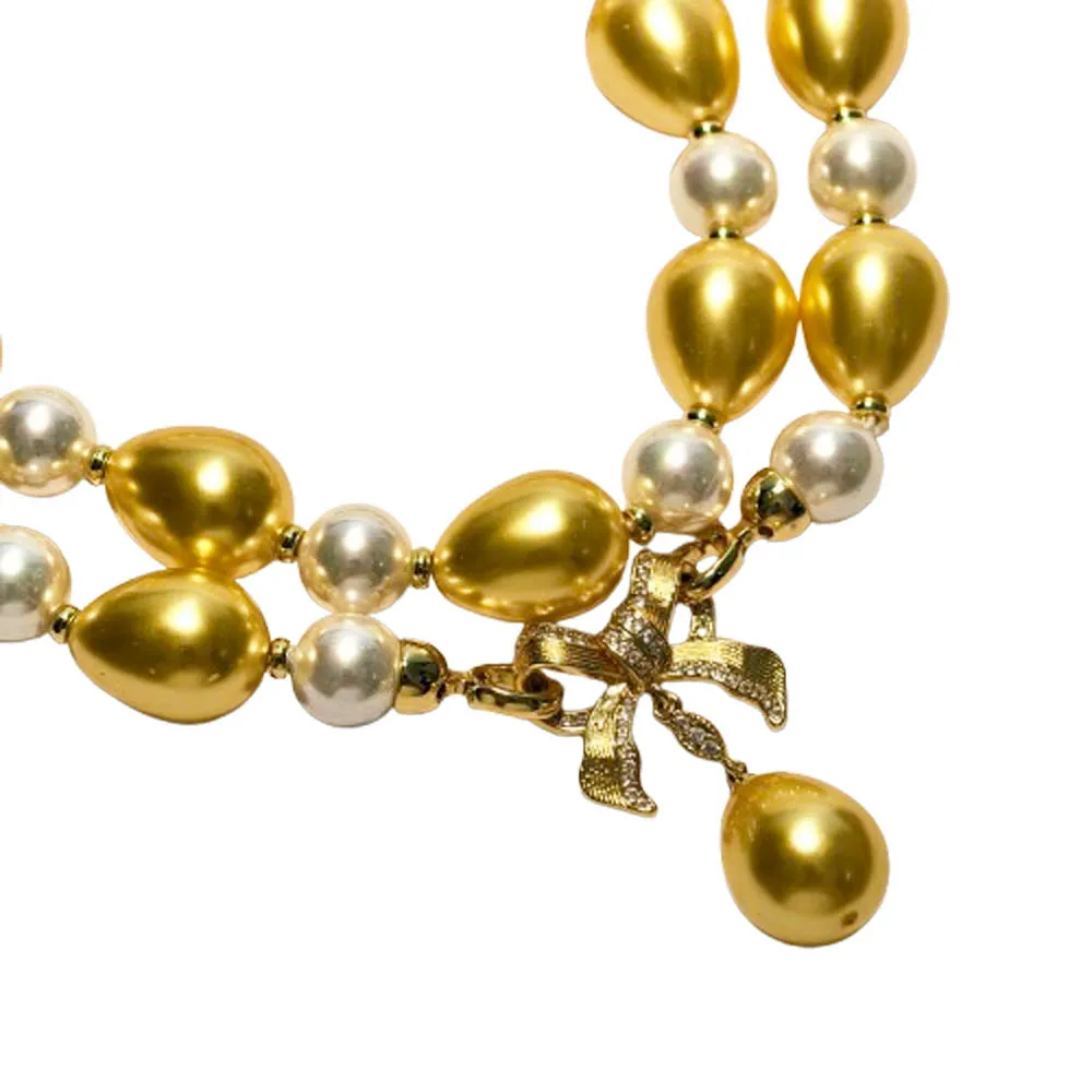 

MTC·STAR 33" 18mm Golden Drop White Round Sunth Sea Shell Pearl Bowknot Necklace Pendant (Z14602)