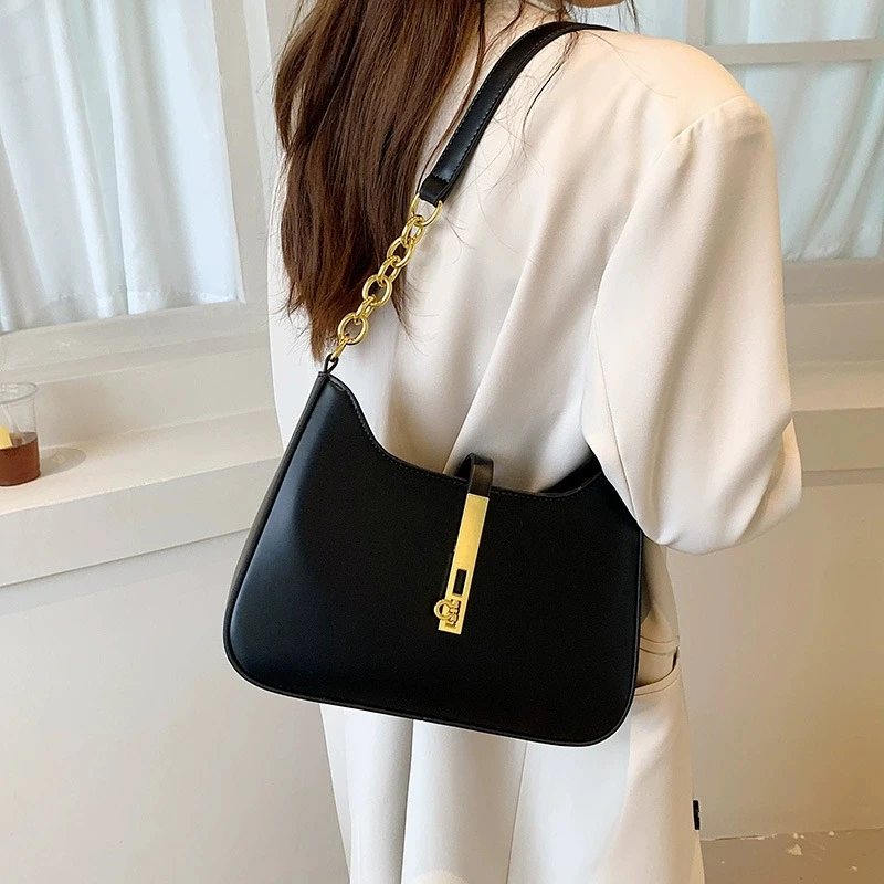 

Elegant Solid Color Handbag Shoulder Bag with Golden-Tone Clasp Design, Versatile for Casual Commuter Wear, All Match Armpit Bag