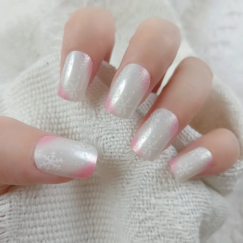 

24pcs Fresh Pink & White Press-On Nails with Delicate Snowflake Accents, Long Coffin Shape, Assorted Sizes