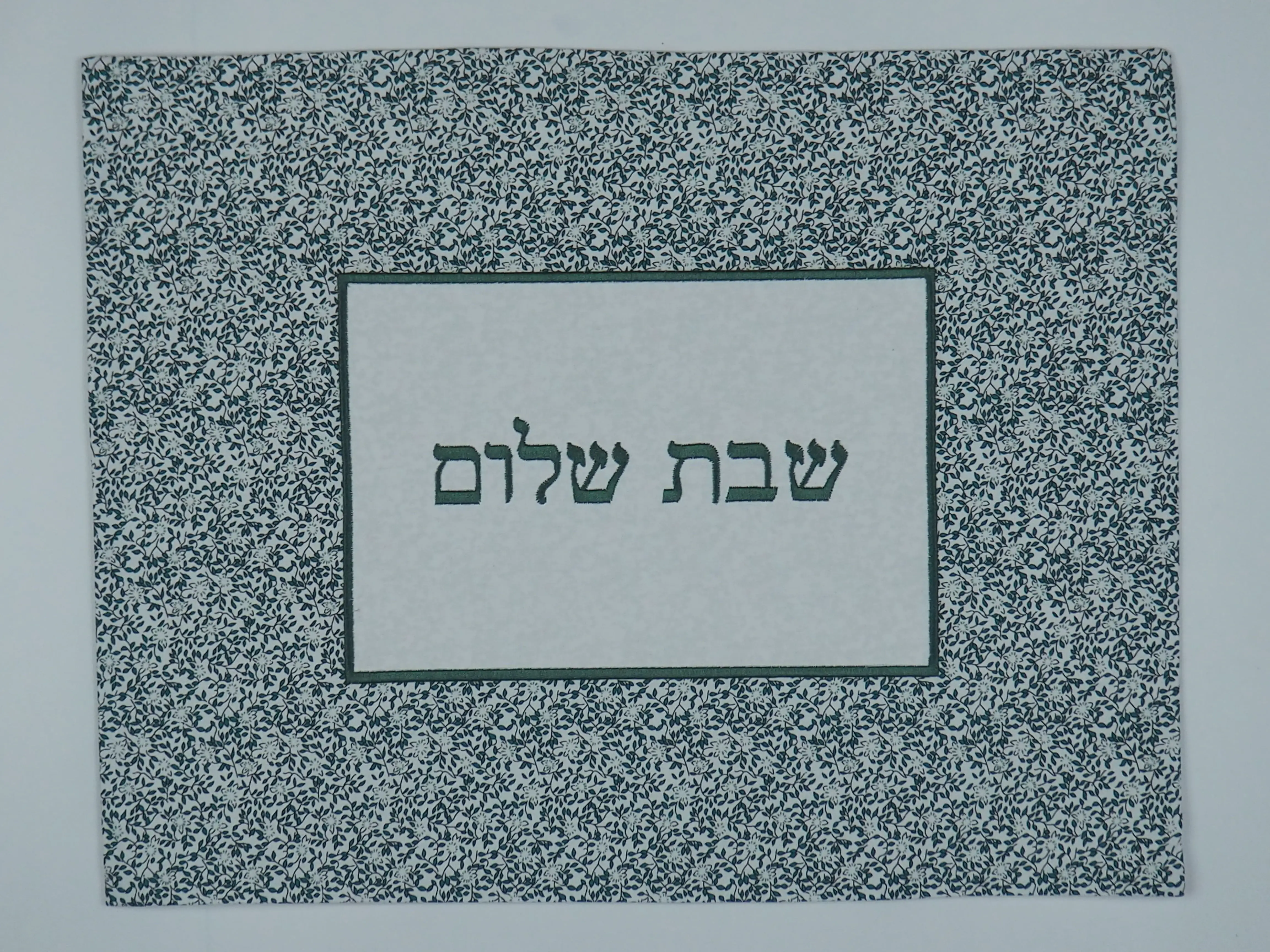 FABRIC PLACEMAT WITH DARK GREEN EMBROIDERY