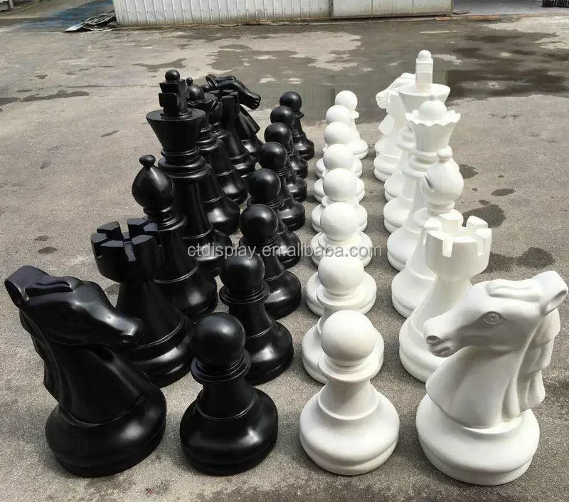 Child playing giant chess game Life Size fiberglass chess piece sculpture for sale