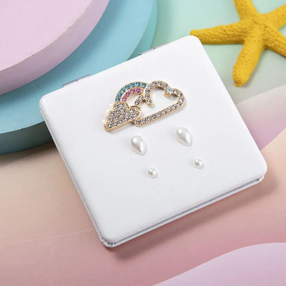 Kleine opvouwbare draagbare dubbelzijdige make-upspiegel Compacte metalen reistasspiegel Lichtgewicht ontwerp