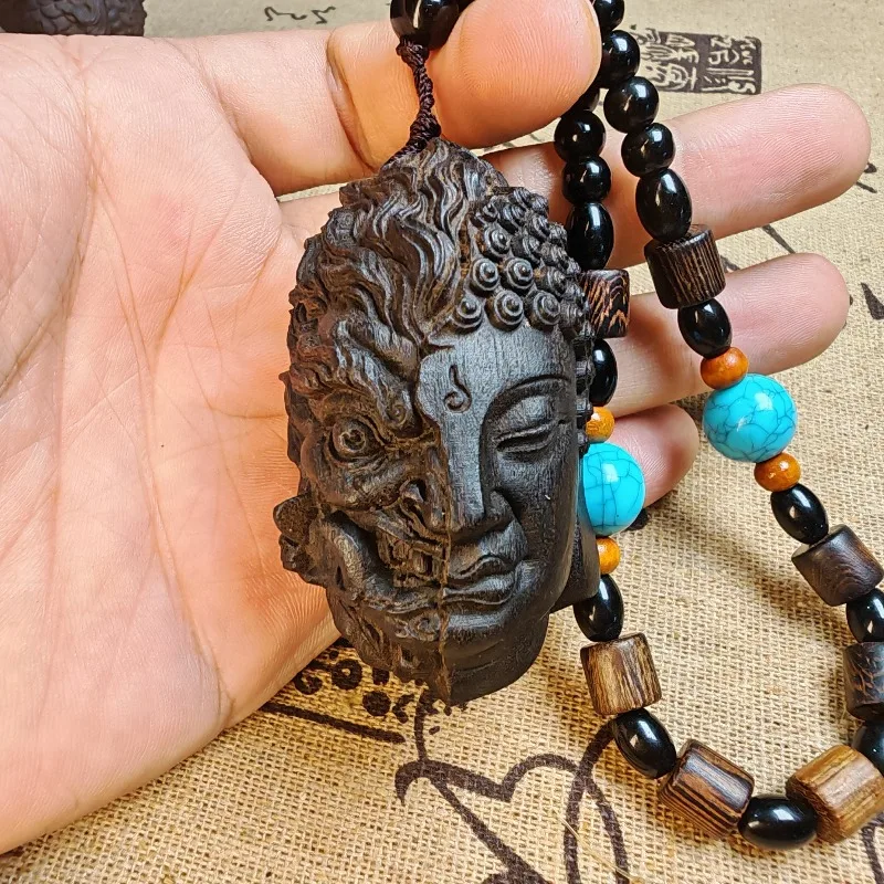 Hand-Carved Wood Buddha and Demon Face Pendant - 2.4